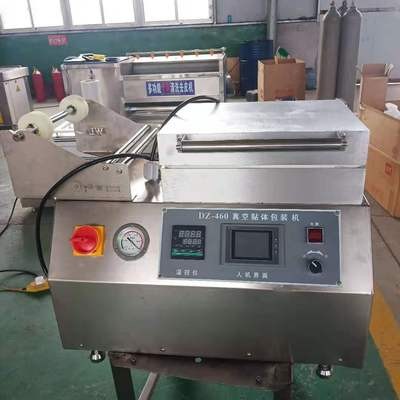 450型小贴体包装机鲜鱼片贴体包装机 肉饼覆膜贴体真空包装机价格图4
