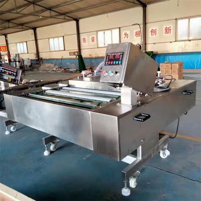 供应全自动连续真空包装机 酸笋滚动真空机 蒜米真空包装封口机图2