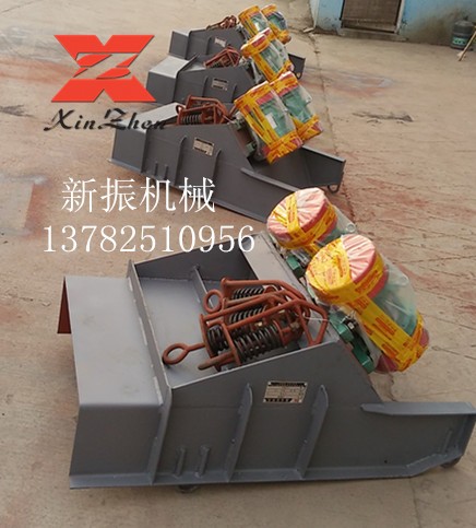 买振动给料机就选新振机械