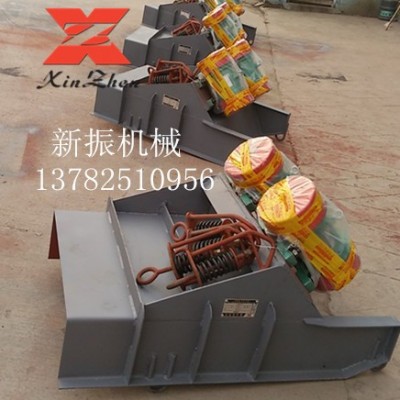 买振动给料机就选新振机械