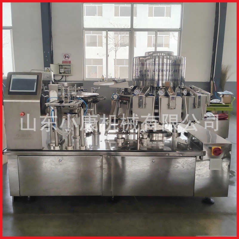 小康XK-130Z年糕全自动真空包装机 旋转给袋式食品真空包装生产线图2