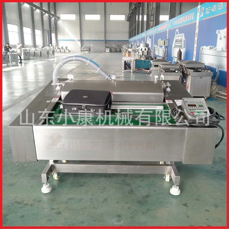 供应连续滚动真空包装机 山楂糕封口机 鸭翅根滚动式真空包装机图2