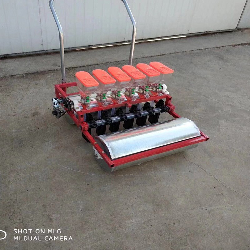 电动手推式四行蔬菜播种机 厂家直销量大优惠手推式蔬菜播种机图5