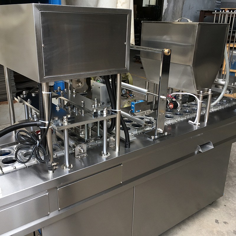 一出二机械式灌装封口机 羊肉卷盒装封口机 餐盒包装封口机图3