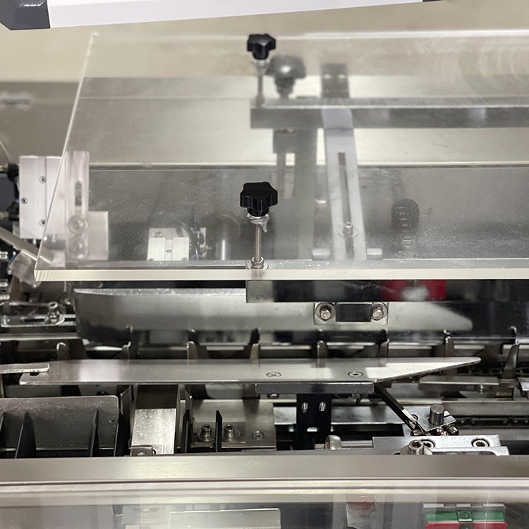 迷你装盒机馒头夹心饼干计数盒装机 食品高速装盒机厂家图2