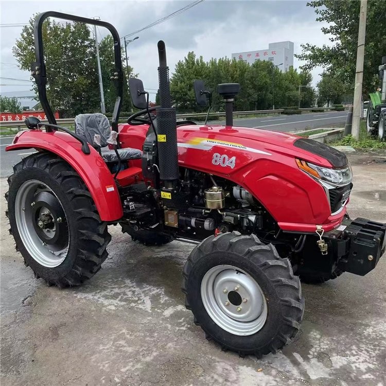 东方红动力704四缸柴油拖拉机 液压转向灵活打地机 可悬挂各种农具