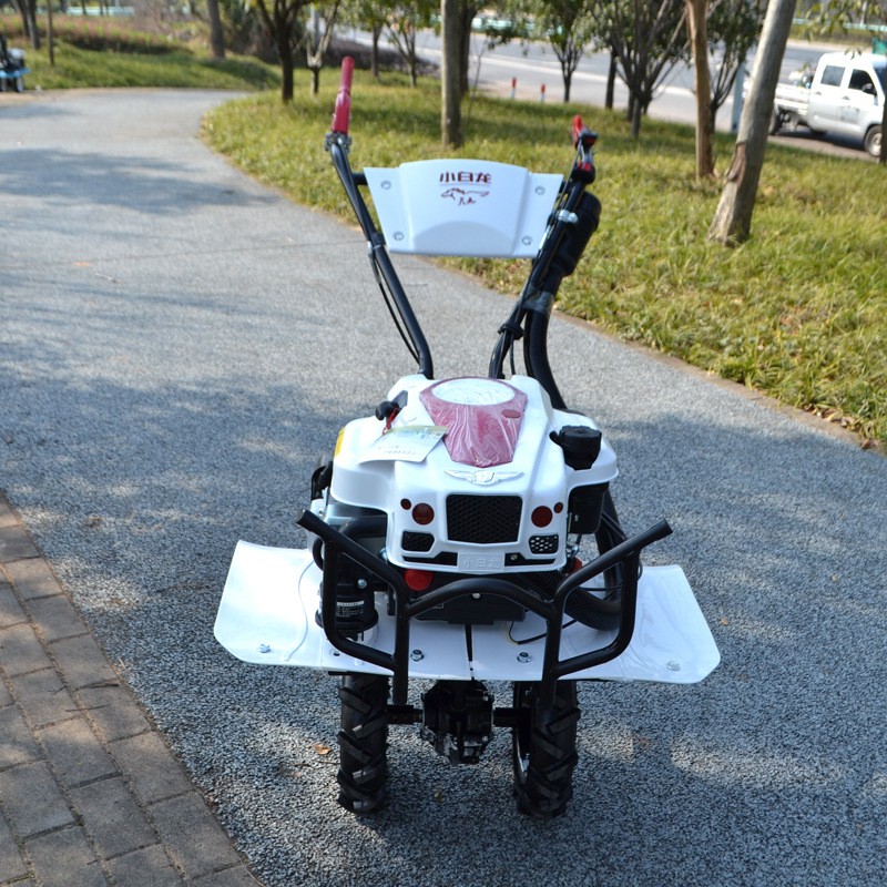 小白龙微耕机水旱两用旋耕机汽油小型耕地机家用犁地翻土机打田机图2