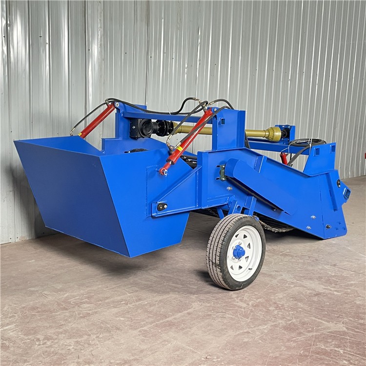 农田开荒耕地捡石机器 拖拉机带的有石头的收集箱